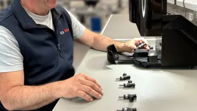 Man registering single parts in factory with Origify