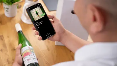 Man verifying wine bottle with Origify